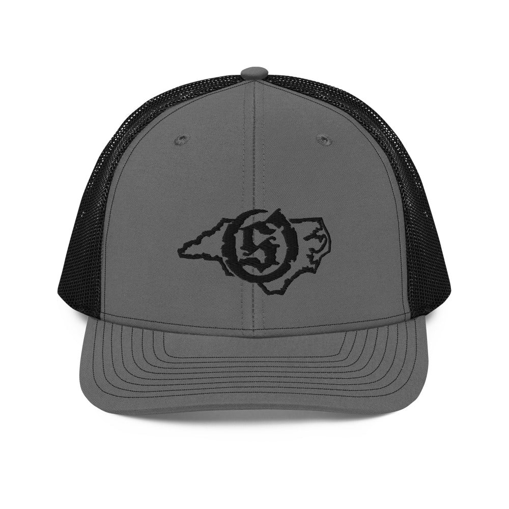 Sail On NC trucker hat in Charcoal/Black with black thread embroidered logo, front view