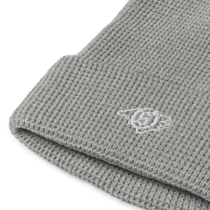 Sail On NC waffle beanie in Heather Grey with white thread embroidered logo, close-up view